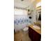 Updated bathroom with granite vanity and shower/tub combo at 326 Benton St, Orlando, FL 32839
