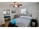 Guest bedroom with a full bed and ceiling fan at 326 Benton St, Orlando, FL 32839