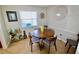 Charming dining area with round table and four chairs at 326 Benton St, Orlando, FL 32839