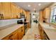 Kitchen with light wood cabinets and stainless steel appliances at 326 Benton St, Orlando, FL 32839