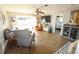 Open living room with hardwood floors and access to bedroom at 326 Benton St, Orlando, FL 32839