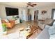 Living room with comfy seating and hardwood floors at 326 Benton St, Orlando, FL 32839
