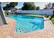 Relaxing kidney-shaped pool with brick pavers at 326 Benton St, Orlando, FL 32839