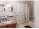 Bathroom with double vanity, tub, and shower at 3583 Conroy Rd # 1135, Orlando, FL 32839