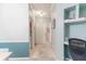 Light and airy entryway with tile flooring and access to laundry area at 3583 Conroy Rd # 1135, Orlando, FL 32839