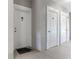 Hallway with unit door and storage at 3583 Conroy Rd # 1135, Orlando, FL 32839
