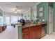 Kitchen boasts granite countertops, modern cabinets, and a breakfast bar at 3583 Conroy Rd # 1135, Orlando, FL 32839