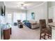 Bright living room with comfy seating and balcony access at 3583 Conroy Rd # 1135, Orlando, FL 32839