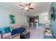 Bright living room with open floor plan and kitchen access at 3583 Conroy Rd # 1135, Orlando, FL 32839