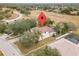 Aerial view of the property showcasing the home's layout, landscaping, and proximity to surrounding community features at 3689 Rolling Hills Ln, Apopka, FL 32712