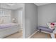 Bedroom featuring plushy decor, carpet, a bed and a door to the bathroom at 3689 Rolling Hills Ln, Apopka, FL 32712