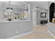 Stylish dining room with modern chandelier, large artwork, and elegant decor at 3689 Rolling Hills Ln, Apopka, FL 32712