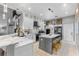 Modern kitchen featuring a marble countertop, stainless steel appliances, and pendant lighting, designed for culinary enthusiasts at 3689 Rolling Hills Ln, Apopka, FL 32712