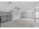 Upstairs loft space with neutral colors and ceiling fans offers flexible living space at 3689 Rolling Hills Ln, Apopka, FL 32712