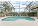 Screened in pool with lush landscaping providing a private retreat for relaxation and outdoor enjoyment at 3689 Rolling Hills Ln, Apopka, FL 32712