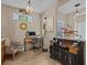 Home office with built-in desk and charming decor at 385 Alcove Dr, Groveland, FL 34736