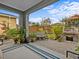 Outdoor patio with brick pavers, seating area, and a built in grill at 385 Alcove Dr, Groveland, FL 34736