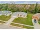 Single-Gathering house with yard, aerial view at 4572 Woodcove Dr, Port Orange, FL 32127