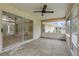 Spacious screened porch with sliding glass doors at 4572 Woodcove Dr, Port Orange, FL 32127