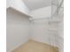 Spacious walk-in closet with ample shelving and hanging rods at 4572 Woodcove Dr, Port Orange, FL 32127