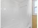 Shower with white tile and shower curtain at 4914 Gran Lac Ave, Belle Isle, FL 32812