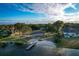 An aerial view shows private lake access with boat ramp and picnic space at 4914 Gran Lac Ave, Belle Isle, FL 32812