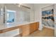 Bathroom with double vanity, large mirror, and tiled floor at 588 Brantley Terrace Way # 303, Altamonte Springs, FL 32714