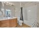 Clean bathroom with tub, shower, and wood vanity at 588 Brantley Terrace Way # 303, Altamonte Springs, FL 32714