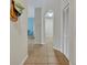 Condo entryway with tile flooring and coat rack at 588 Brantley Terrace Way # 303, Altamonte Springs, FL 32714