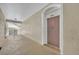 Hallway with mauve door to condo unit 303 at 588 Brantley Terrace Way # 303, Altamonte Springs, FL 32714