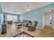 Living Room with gray sectional sofa and light blue walls at 588 Brantley Terrace Way # 303, Altamonte Springs, FL 32714