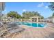 Refreshing community pool with lounge chairs and shaded seating area at 588 Brantley Terrace Way # 303, Altamonte Springs, FL 32714