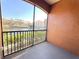 Screened balcony with scenic lake and community views at 6149 Metrowest Blvd # 106, Orlando, FL 32835
