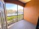 Screened balcony overlooking a lake and community at 6149 Metrowest Blvd # 106, Orlando, FL 32835