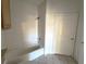 Simple bathroom with a bathtub and shower at 6149 Metrowest Blvd # 106, Orlando, FL 32835