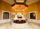 Ornate lobby featuring a fountain and holiday decor at 6149 Metrowest Blvd # 106, Orlando, FL 32835