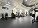 Fitness center featuring cardio equipment and inspiring wall art at 6149 Metrowest Blvd # 106, Orlando, FL 32835
