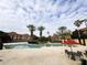 Inviting resort-style pool with ample seating and patio area at 6149 Metrowest Blvd # 106, Orlando, FL 32835