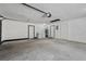 Spacious garage with washer, dryer, and ample storage at 630 Sailfish Rd, Winter Springs, FL 32708