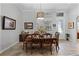 Elegant dining room with a wood table and six chairs at 7836 Crosswinds Way, Mount Dora, FL 32757