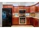 Well-equipped kitchen with stainless steel appliances at 7836 Crosswinds Way, Mount Dora, FL 32757