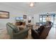 Relaxing living room with comfortable seating and views at 7836 Crosswinds Way, Mount Dora, FL 32757