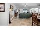 Spacious living room with leather seating and tile floors at 7836 Crosswinds Way, Mount Dora, FL 32757