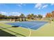 Enjoy a tennis match on this court at 7836 Crosswinds Way, Mount Dora, FL 32757