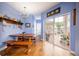 Cozy breakfast nook with built-in bench seating and backyard access at 8773 Silk Bay Pl, Orlando, FL 32827