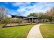 Community playground with shaded areas and play equipment at 8773 Silk Bay Pl, Orlando, FL 32827