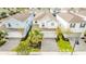 Townhouses with attached garages and landscaping at 8906 Zurich Ln, Kissimmee, FL 34747