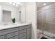 Modern bathroom with double vanity and walk-in shower at 8906 Zurich Ln, Kissimmee, FL 34747