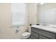 Clean bathroom with single vanity and toilet at 8906 Zurich Ln, Kissimmee, FL 34747