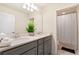 Modern bathroom with double vanity and shower/tub combo at 8906 Zurich Ln, Kissimmee, FL 34747